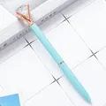 Premium light blue metal ballpoint pen featuring a large faceted crystal diamond topper - Candy Blue / 1.0mm Bullet Tip