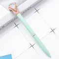 Elegant mint green metal ballpoint pen featuring a large faceted crystal diamond - Candy Green / 1.0mm Bullet Tip