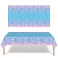 Detail view of snowflake pattern on blue and pink gradient party tablecloth. - Tablecloth