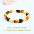 Macro detail view of natural multi-colored amber bracelet featuring irregular beads - Irregular Approx 6-7mm / Multicolor Irregular Amber Bracelet (S6062403)