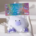 Detail of a white fluffy pig squeeze toy in colorful packaging for effective stress relief - Large Lucky Pig (White Type 1)
