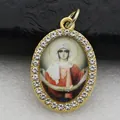 Detailed macro view of an oval religious icon pendant with rhinestone micro-setting - Gold Vintage Portrait Style (DZJFT001) / Gold