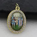 Detailed macro view of an oval gold pendant with micro-pave stones and religious icon - Gold Archangel Portrait Style (DZJFT001) / Gold Green
