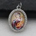 Close-up detail of oval religious icon pendant with sparkling rhinestone border - Silver Traditional Art Icon Style (DZJFT001) / Silver Purple