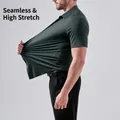 Dark green high-stretch men's seamless polo shirt demonstrating elasticity - XS / Tops / Army Green Short Sleeve