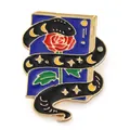 Artistic enamel pin badge featuring a mystical snake wrapped around a rose and book - Snake Book Rose Style (JEWB-S024-03C)