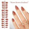 Elegant warm brown gradient almond-shaped press-on nails SKU display on hand - Ombre Brown