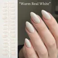 Short almond-shaped handmade press-on nails in a glossy warm solid white finish - Warm Solid White (DXR14#)