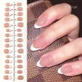 Elegant short almond press-on nails with classic white French tips in a nude pink base - French Dusty Pink (FS03#)