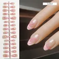Elegant nude almond press-on nails featuring pink heart swirl patterns, SJ06 model - SJ06#