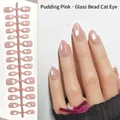 Handmade almond press-on nails with a pudding pink cat eye shimmer glass bead effect - Pudding Pink Cat Eye (MY17#)