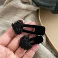 Pair of black velvet heart-shaped duckbill hair clips with sparkling plush texture - Black Heart Clip (Pair) / Black