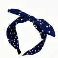 Retro navy blue polka dot headband with a cute bow knot for a classic hair accessory look. - Navy Blue