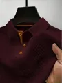 Detail view of men's burgundy mesh polo shirt with waffle knit texture and contrast collar - Burgundy