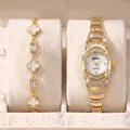 Elegant gold watch and clover bracelet set with sparkling rhinestones for women - Gold Watch + Four Leaf Clover Bracelet