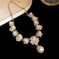 Elegant 18k gold plated zircon pearl necklace for women featuring high luxury luster shine - Necklace / Gold