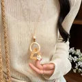 Retro aesthetic geometric wooden ring and woven triangle pendant sweater chain necklace - Beige & Coffee - Geometric