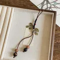 Vintage Maillard style sweater chain necklace with wood beads and bronze leaf charms - Alloy Leaf Texture Style (30#)