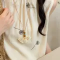 Handmade retro bohemian woven fan pendant necklace with wood beads on linen dress - Beige - Fan-shaped Woven