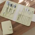 Professional 16-piece manicure set in a cream beige leather case for travel grooming. - 12-Piece Set (Milky White)