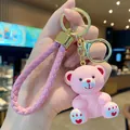 Cute pink resin bear keychain with braided strap for handbags and car keys decoration - Sitting Resin Bear-Pink