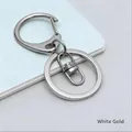 Accessorio portachiavi in metallo lucido con fibbia a D e moschettone bianco K - Argento