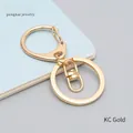 Chiusura a moschettone in metallo oro KC con anello girevole per portachiavi fai da te - Oro KC
