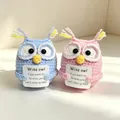 Handmade crochet owl dolls in pink and blue holding cute motivational support cards. - Owl Couple