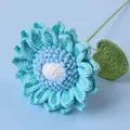 Hand-knitted blue crochet sunflower with green stem and leaf on blue background - Snow Five Double-layer Sunflower - Blue