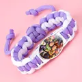 Gedetailleerd overzicht van Toy Story Woody en Buzz bedel op paarse gevlochten armband - 64424603