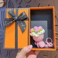 Hand-knitted pink crochet flower bouquet keychain in a premium orange gift box - Pink Rose (Orange Gift Box)