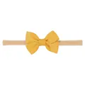 Diadema con lazo de cinta de grosgrain amarilla para bebés con banda elástica de nailon - Amarillo jengibre