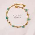 Elegant stainless steel bracelet with natural turquoise beads and gold accents. - Amazonite Bracelet