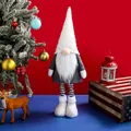 Nordische Weihnachts-Gnom-Puppe mit weißem Hut und Teleskopbeinen für die Festdeko. - Teleskop Gesichtslos Puppe Weiß