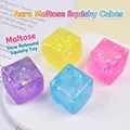 Primer plano de cubos squishy de colores con purpurina para aliviar el estrés y jugar. - Envío Mixto De Cubos De Maltosa Aurora De 5 Cm (opp)