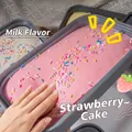 Close-up view of pink strawberry cake-style soft slime toy with colorful sprinkles decoration - Strawberry Cake Box