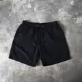 Klassieke casual heren strandshort in zwart met een elastische tailleband koord - M / Zwart