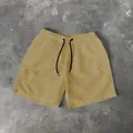 Stylish minimalist tan men's casual beach shorts with black drawstring for summer wear - 3XL / Bottoms / Earthy Yellow