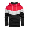 Close-up of men's tricolor block hoodie with red, grey and black chevron pattern detail. - S / Red