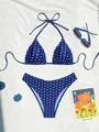 Vista detallada del conjunto de bikini de lunares azul sobre fondo blanco - S / Azul