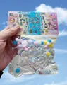Transparentes Katzenpfoten Squishy Stressabbau-Spielzeug mit bunten Pailletten - Volltransparente Katzenpfote Rosa Schleife