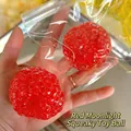 Set de 2 pelotas blandas rojas translúcidas texturizadas para aliviar el estrés - Bola Ruidosa Luz de Luna Roja