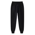 Plain black fleece-lined sweatpants with adjustable drawstring and ribbed cuffs - S / Bottom (1-1) / Black