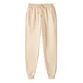 Minimalist solid beige fleece joggers with drawstring waist and ribbed cuffs for men - S / Bottoms / Beige