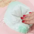 Soft mint green slow rebound squishy stress relief toy being squeezed in a plastic bag - Matcha Cheese Daifuku / 10cm Large / Matcha Green