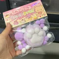 Lindo squishy de pata de gato morado y blanco, juguete antiestrés de crecimiento lento. - Estilo Flocado / Pata de Gato Flocada (Base Púrpura Pata Blanca)