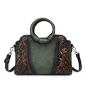 Retro green faux leather handbag with embossed floral pattern and round handles - Green