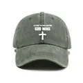 Detailed macro view of washed cotton baseball cap with God Wins text and cross design - One Size / Dark Green