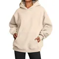 Cozy oversized beige women's hoodie featuring a kangaroo pocket and ribbed cuffs. - Khaki