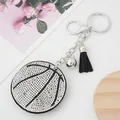 Sparkling rhinestone basketball keychain featuring a black tassel and silver clasp - Black and White Volleyball
